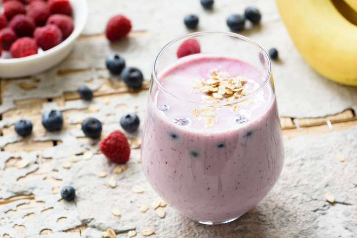 Healthy breakfast smoothie with berries and oats