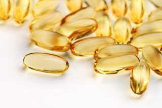 Close up shot with shallow depth field of health supplement oil capsules